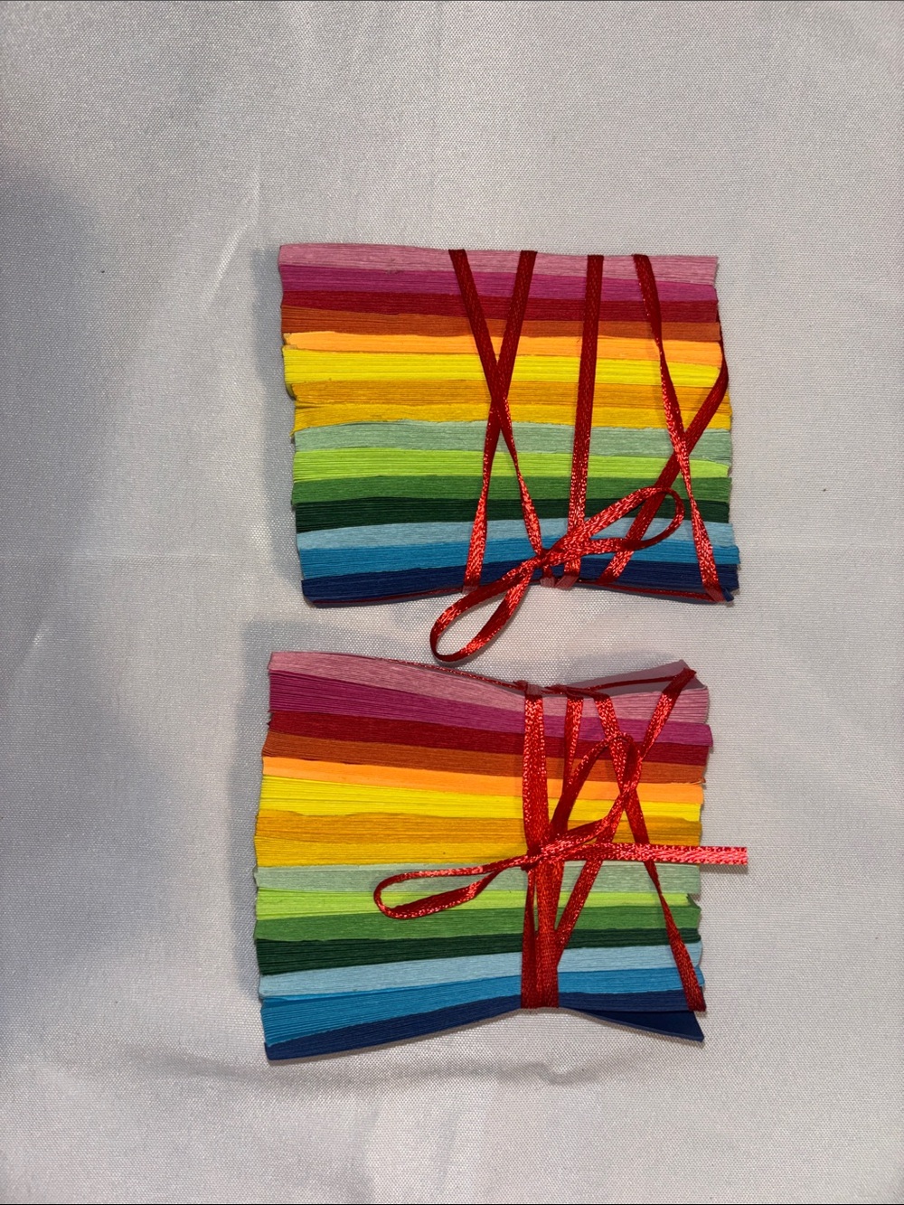Rainbow Paper Banner with Red Ribbon